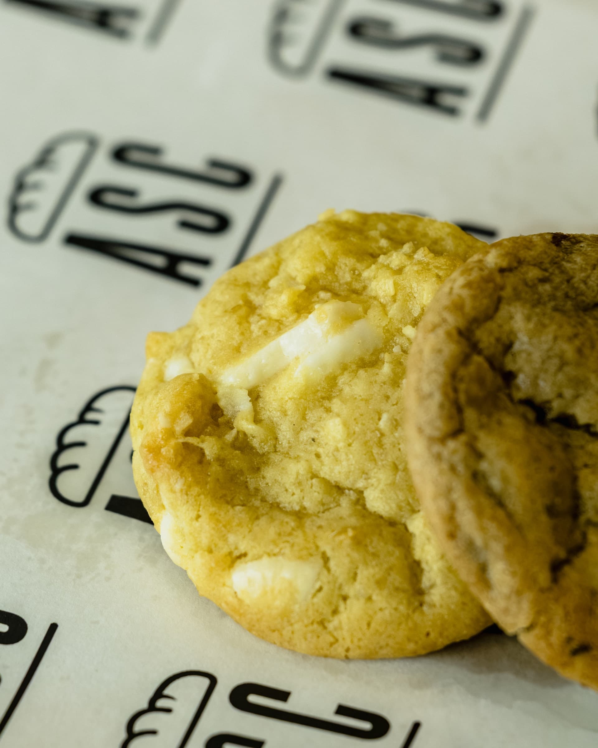 Fresh baked cookies on A Sandwich Co. branded paper